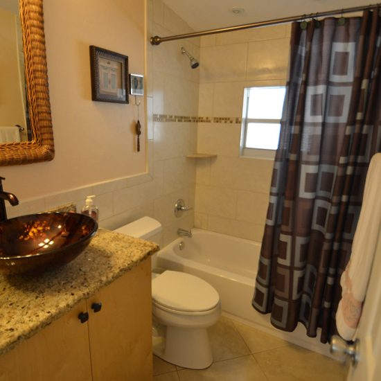 Palm Breeze Bathroom 1 | CSE Properties Vacation Home Rentals Naples FL