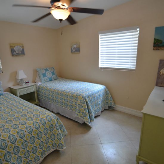 Palm Breeze Double Bed Bedroom | CSE Properties, Naples, FL